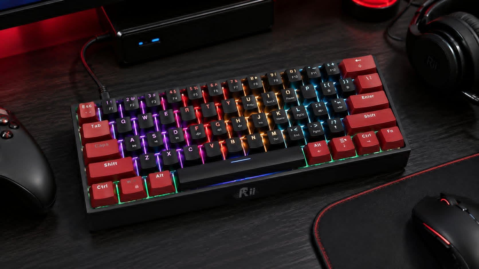 Rii RK806 60% Mechanical Gaming Keyboard with RGB backlight and compact 61-key layout on a gaming desk