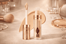 Charlotte Tilbury AIRbrush Flawless Blur Concealer tube with applicator wand close-up
